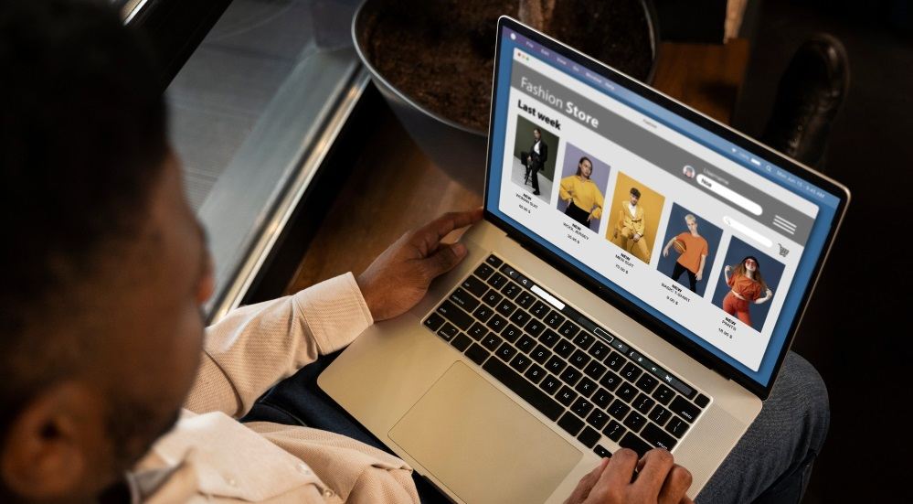 Man visiting ecommerce website on laptop